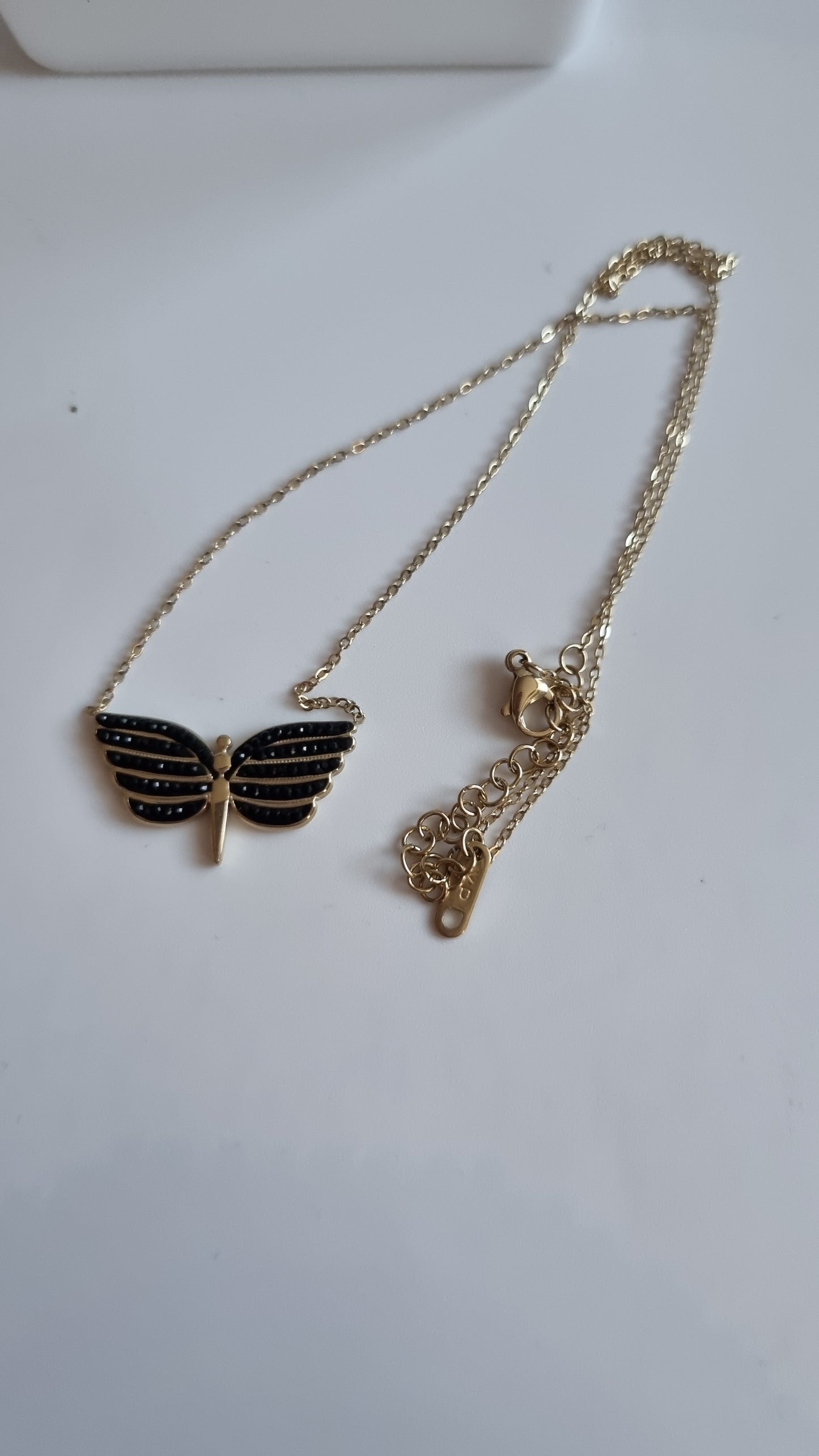 Stainless steel necklace with black sw.crystal angel