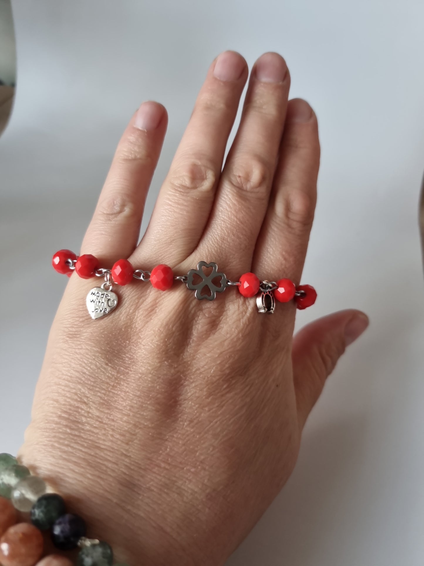 Red color bracelet handmade from faceted glass crystal silver color