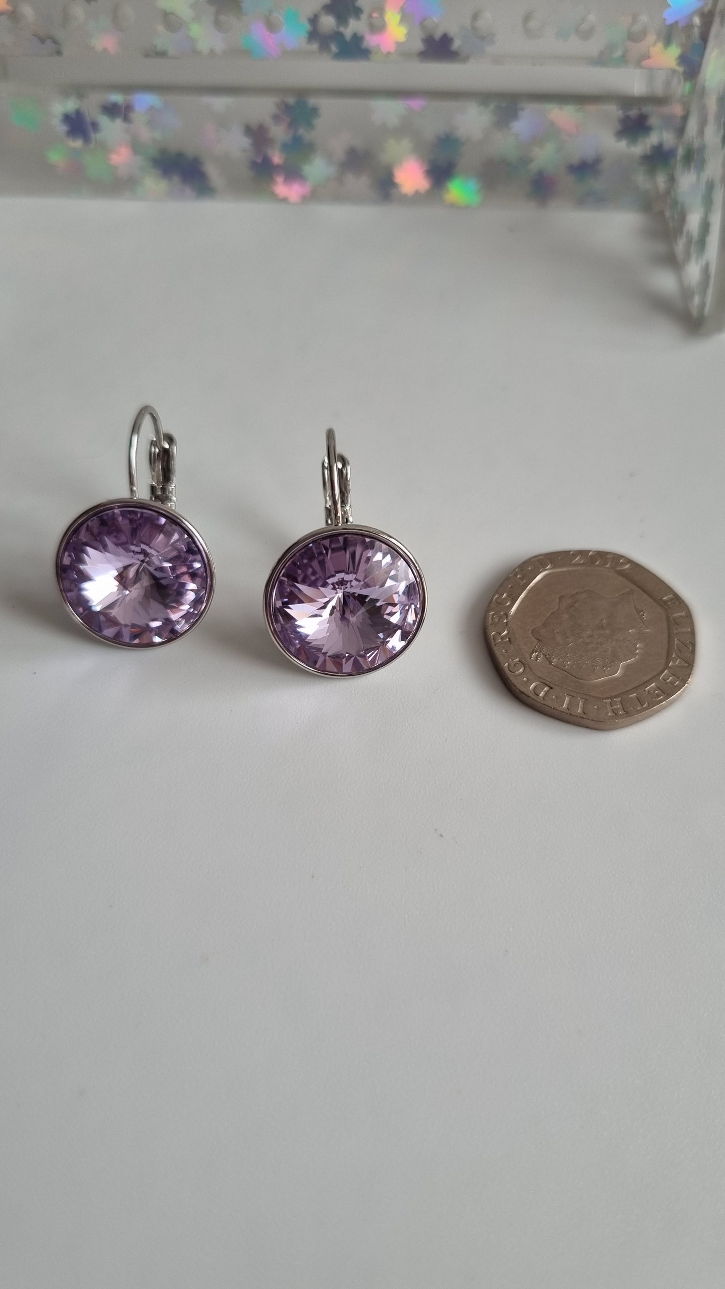 Platinum plated earrings with  violet sw.crystal waterproof hypoallergenic