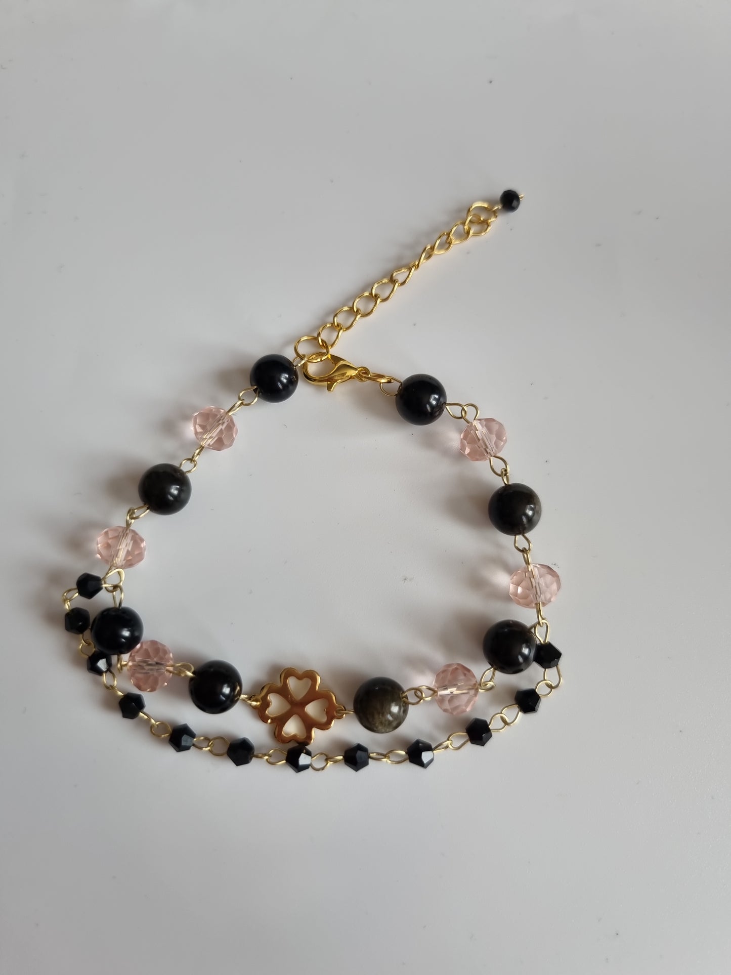 Handmade bracelets from  natural Stone obsidian and glass beads 18kr.gold color