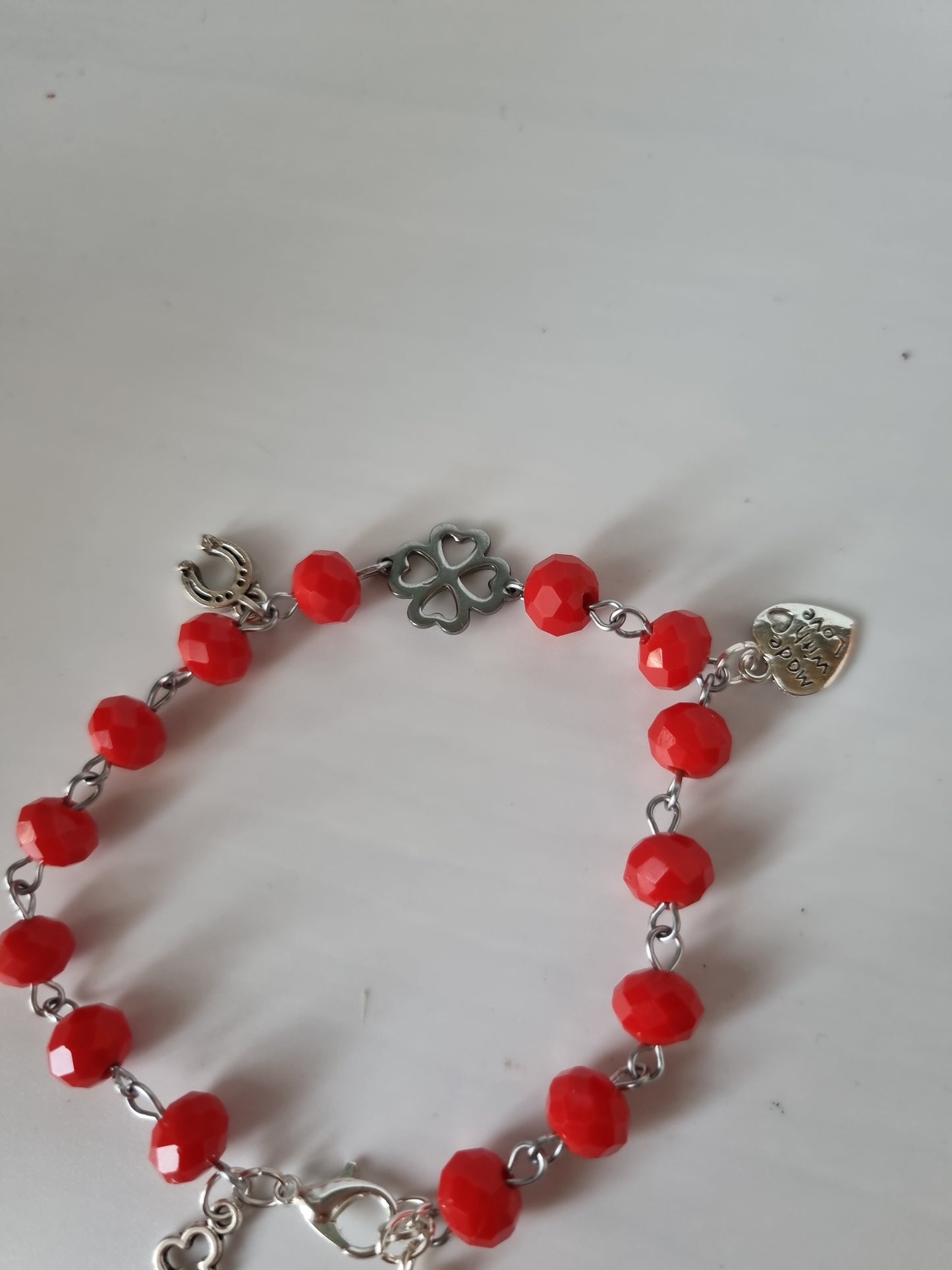 Red color bracelet handmade from faceted glass crystal silver color