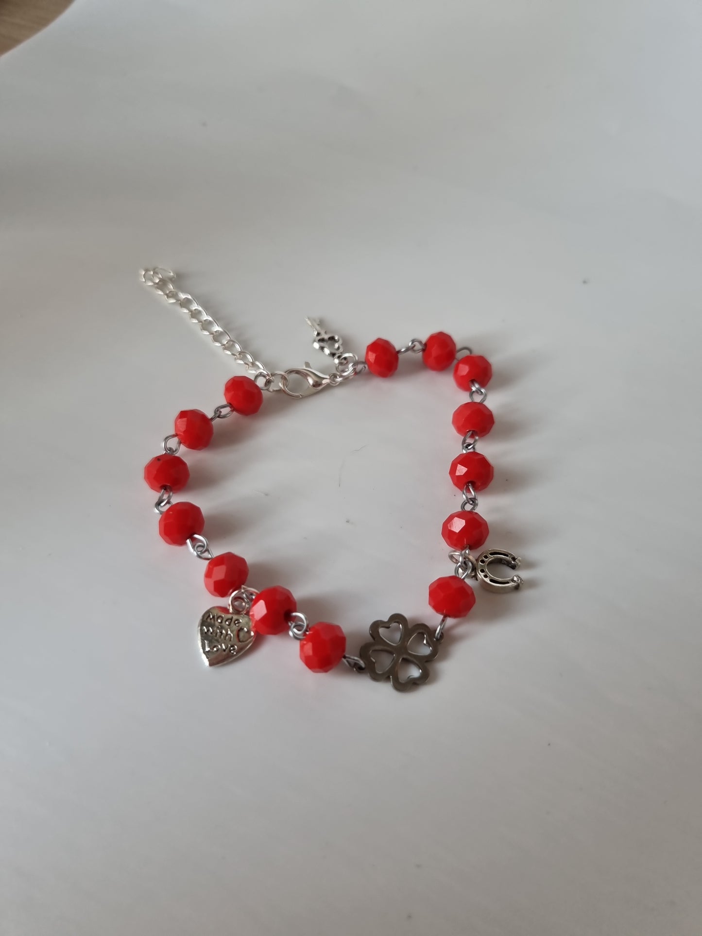 Red color bracelet handmade from faceted glass crystal silver color