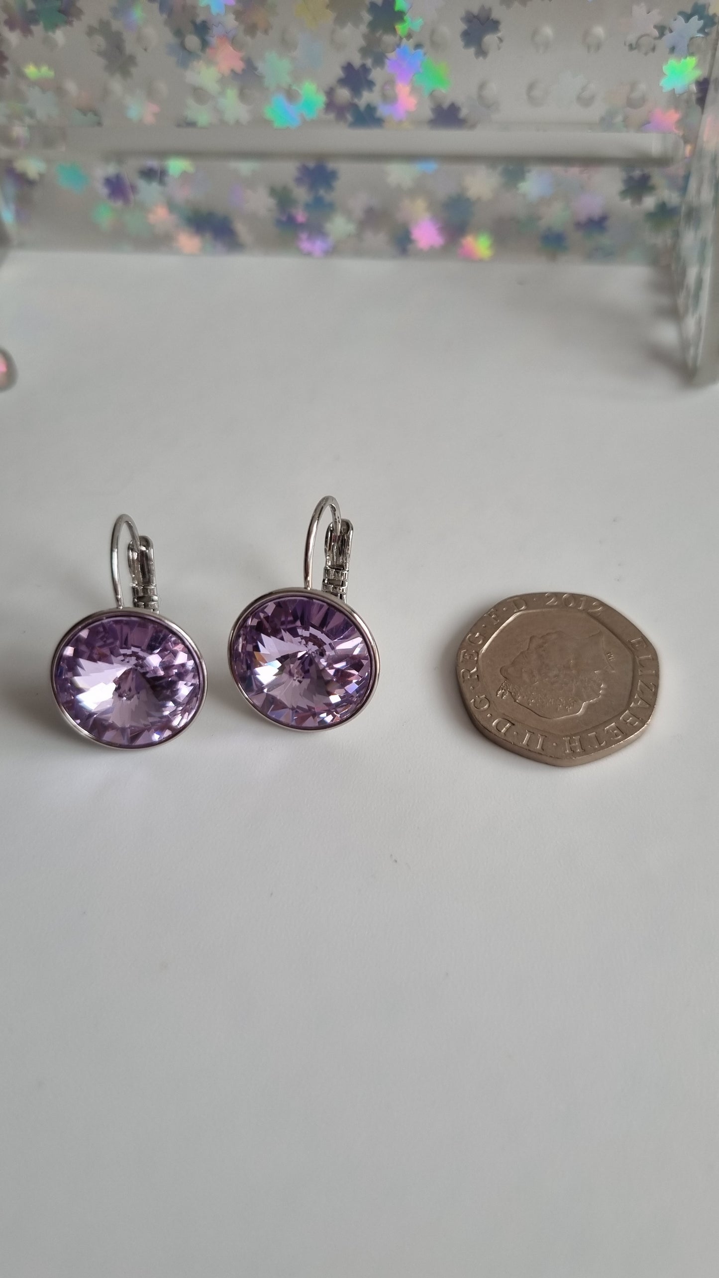 Platinum plated earrings with  violet sw.crystal waterproof hypoallergenic