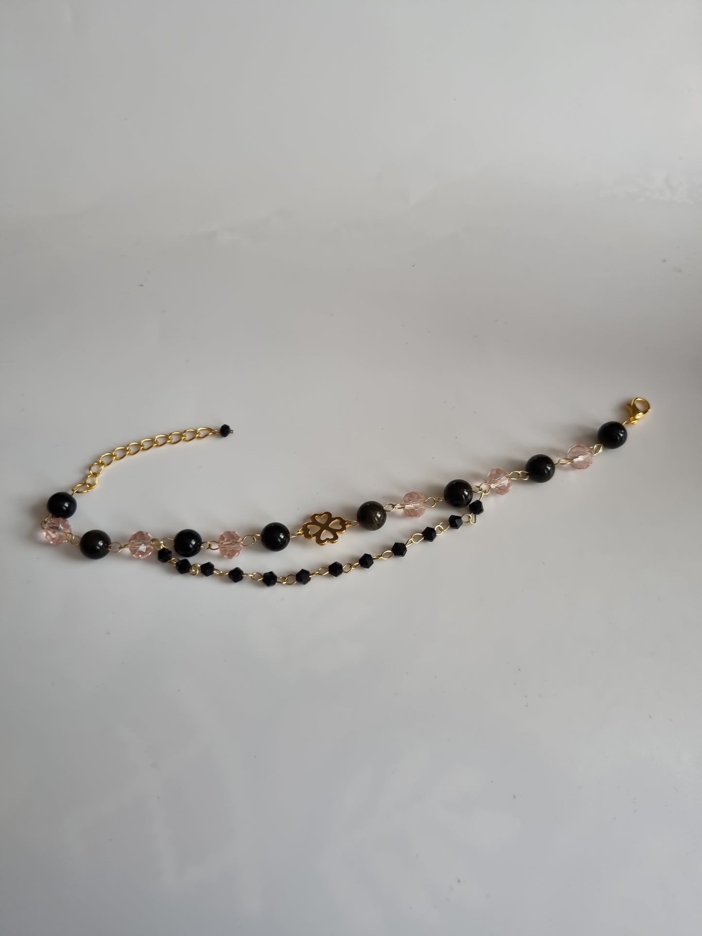 Handmade bracelets from  natural Stone obsidian and glass beads 18kr.gold color