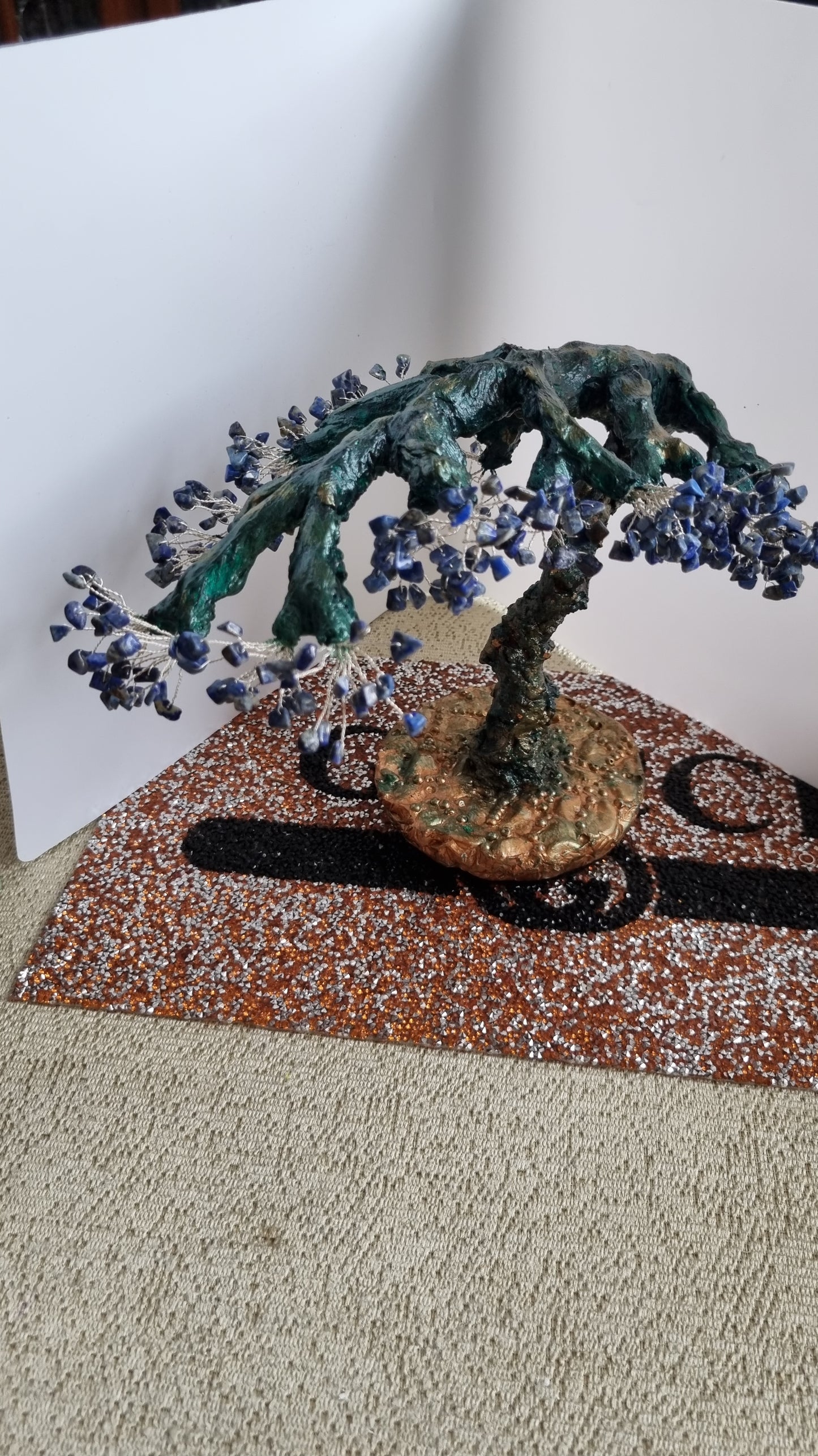 Handmade tree decor in home with natural Stone