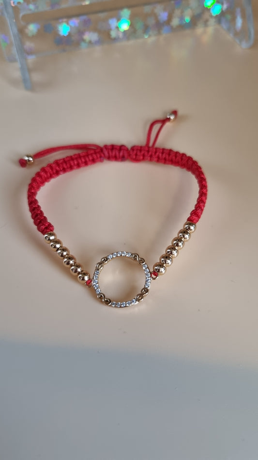 Red color bracelet with hypoallergenic waterproof beads and pendant