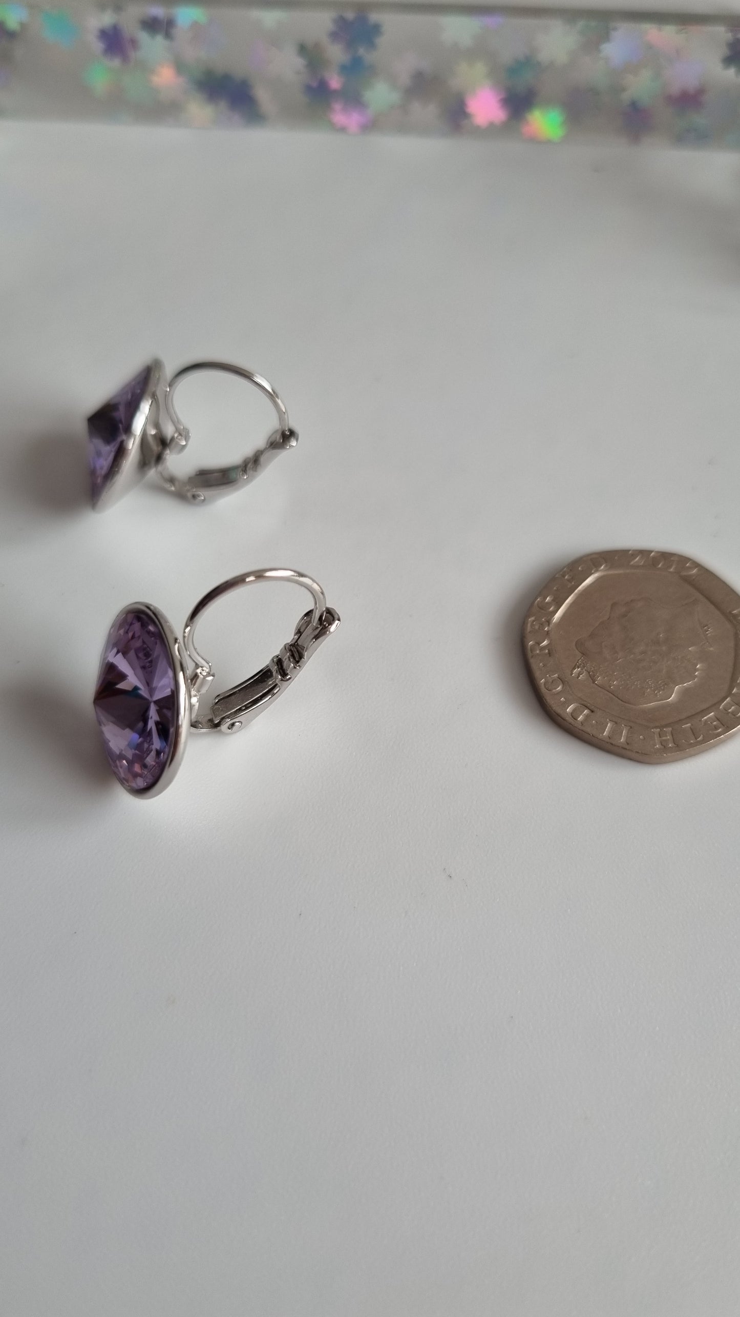 Platinum plated earrings with  violet sw.crystal waterproof hypoallergenic