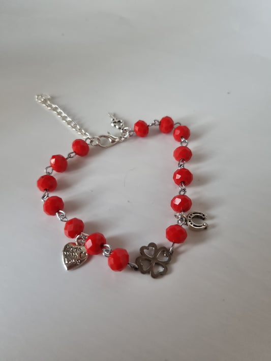 Red color bracelet handmade from faceted glass crystal silver color