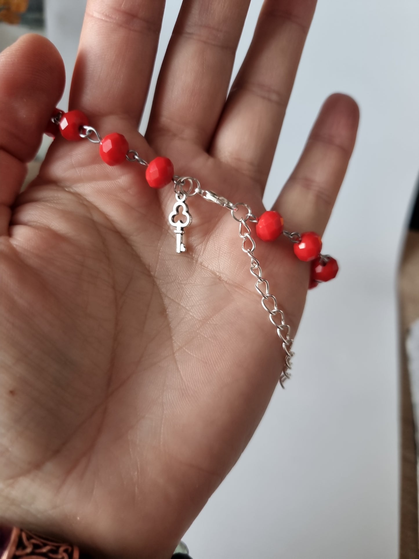 Red color bracelet handmade from faceted glass crystal silver color