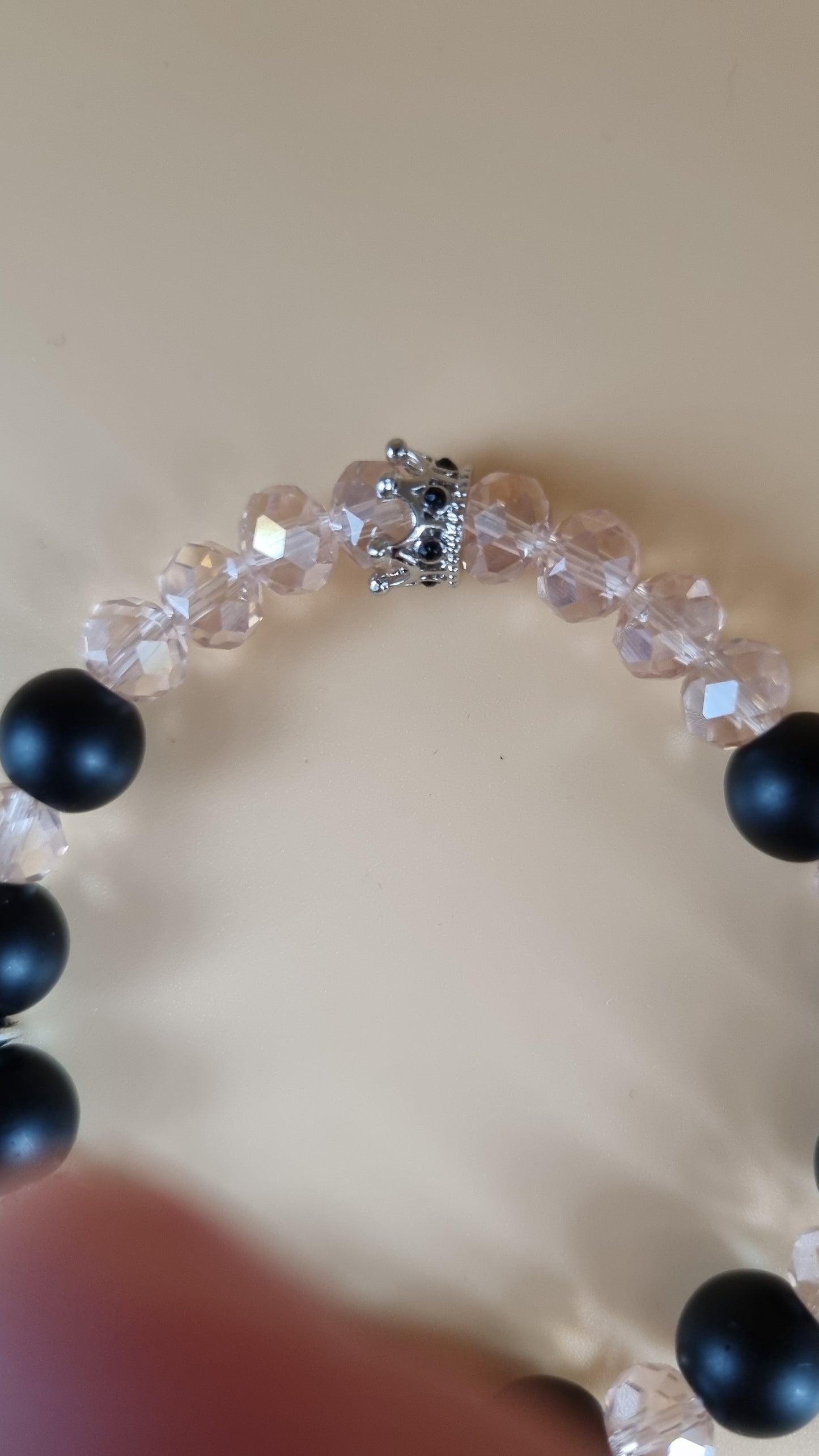 Stretchy bracelet handmade with mate onyx black and glass beads faceted pink color beads