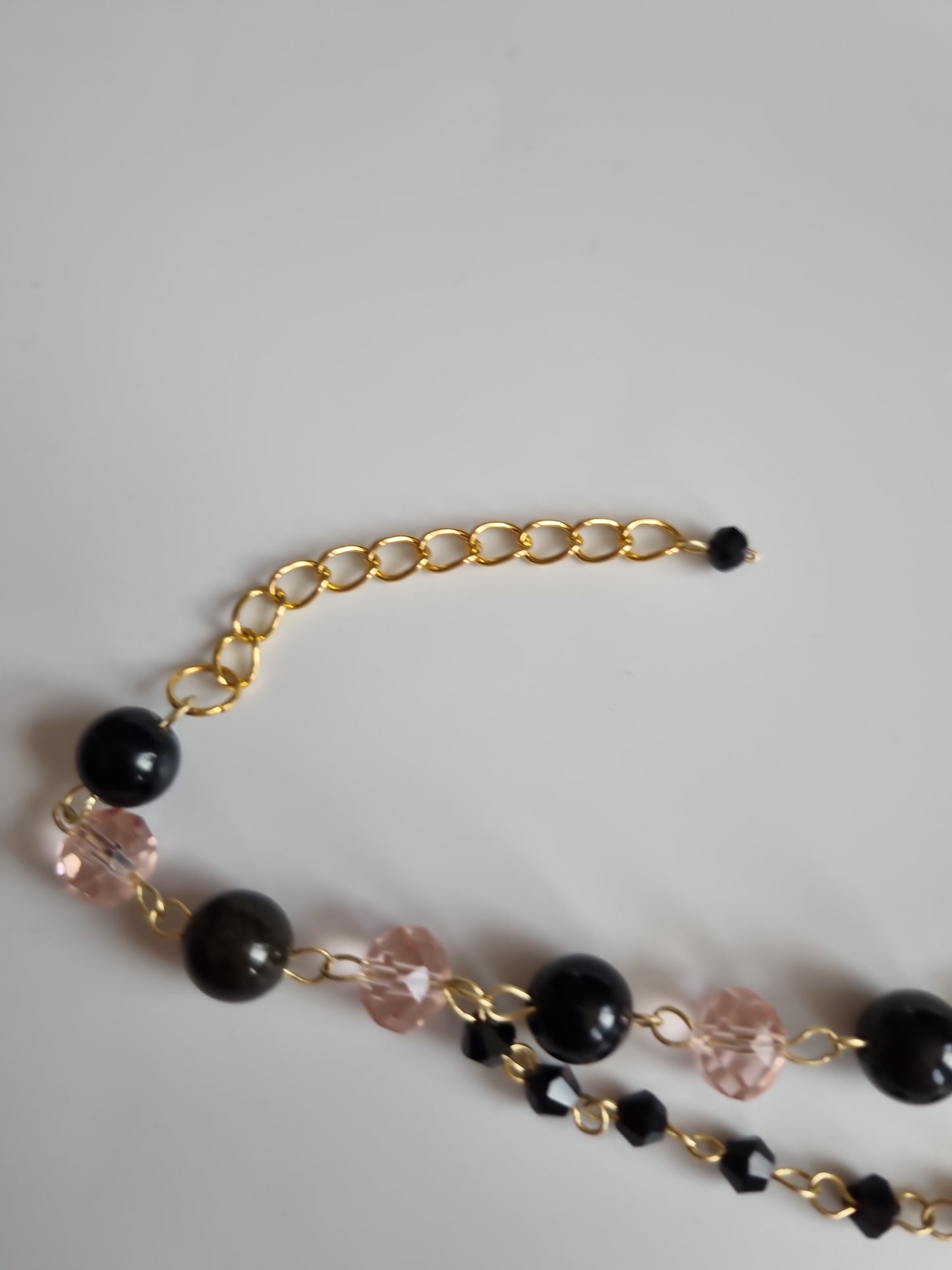 Handmade bracelets from  natural Stone obsidian and glass beads 18kr.gold color