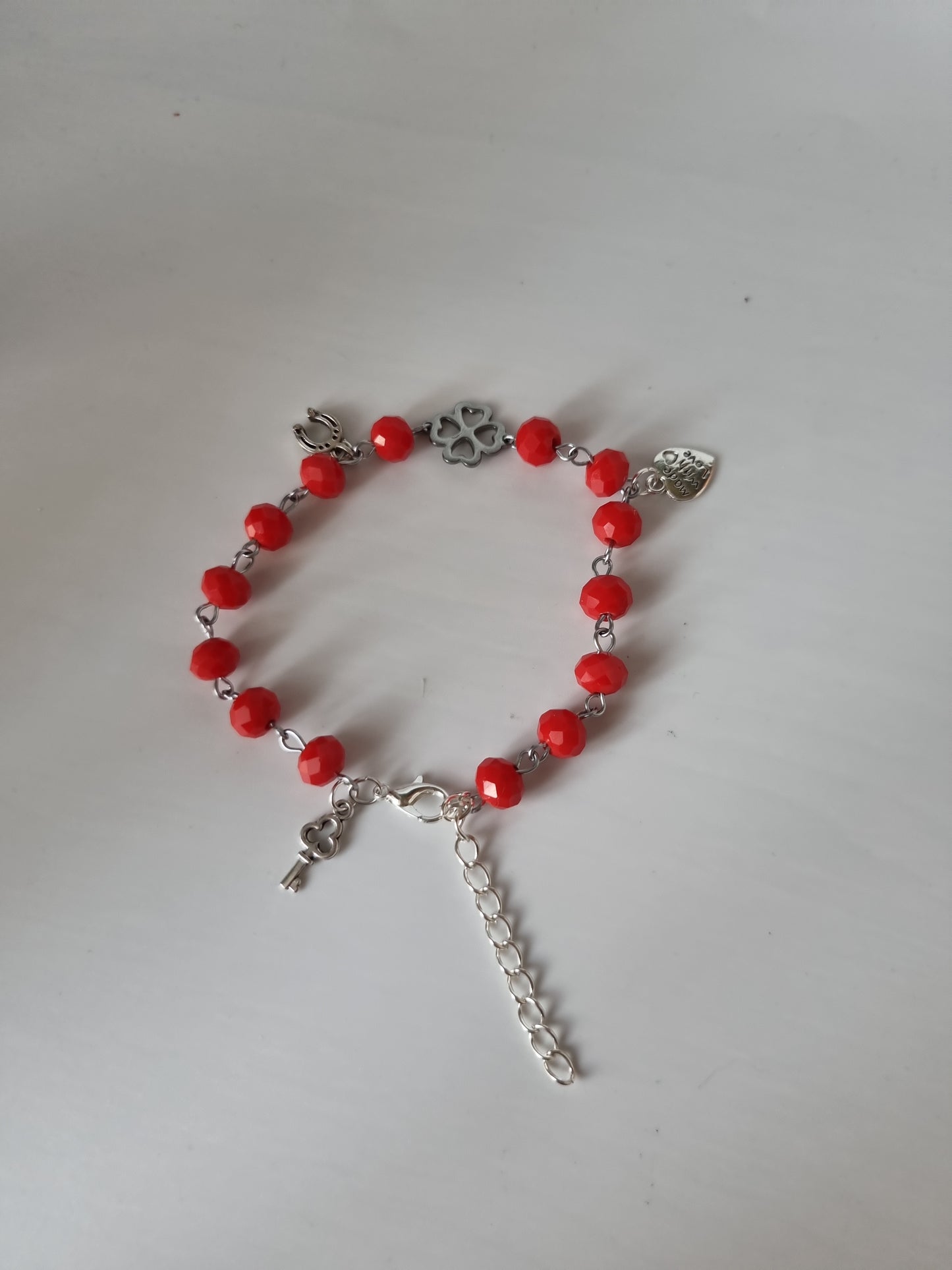 Red color bracelet handmade from faceted glass crystal silver color